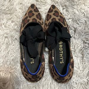 Cheetah print Rothy’s with black bow